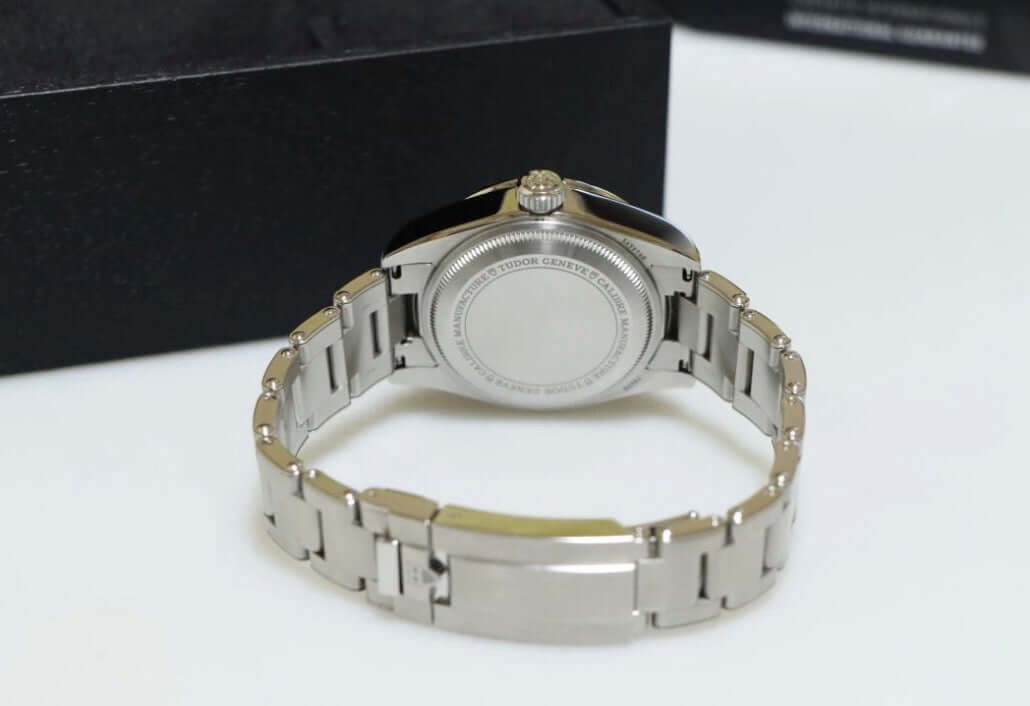 Tudor Black Bay Pro review showing the watch case and steel bracelet from the back side.