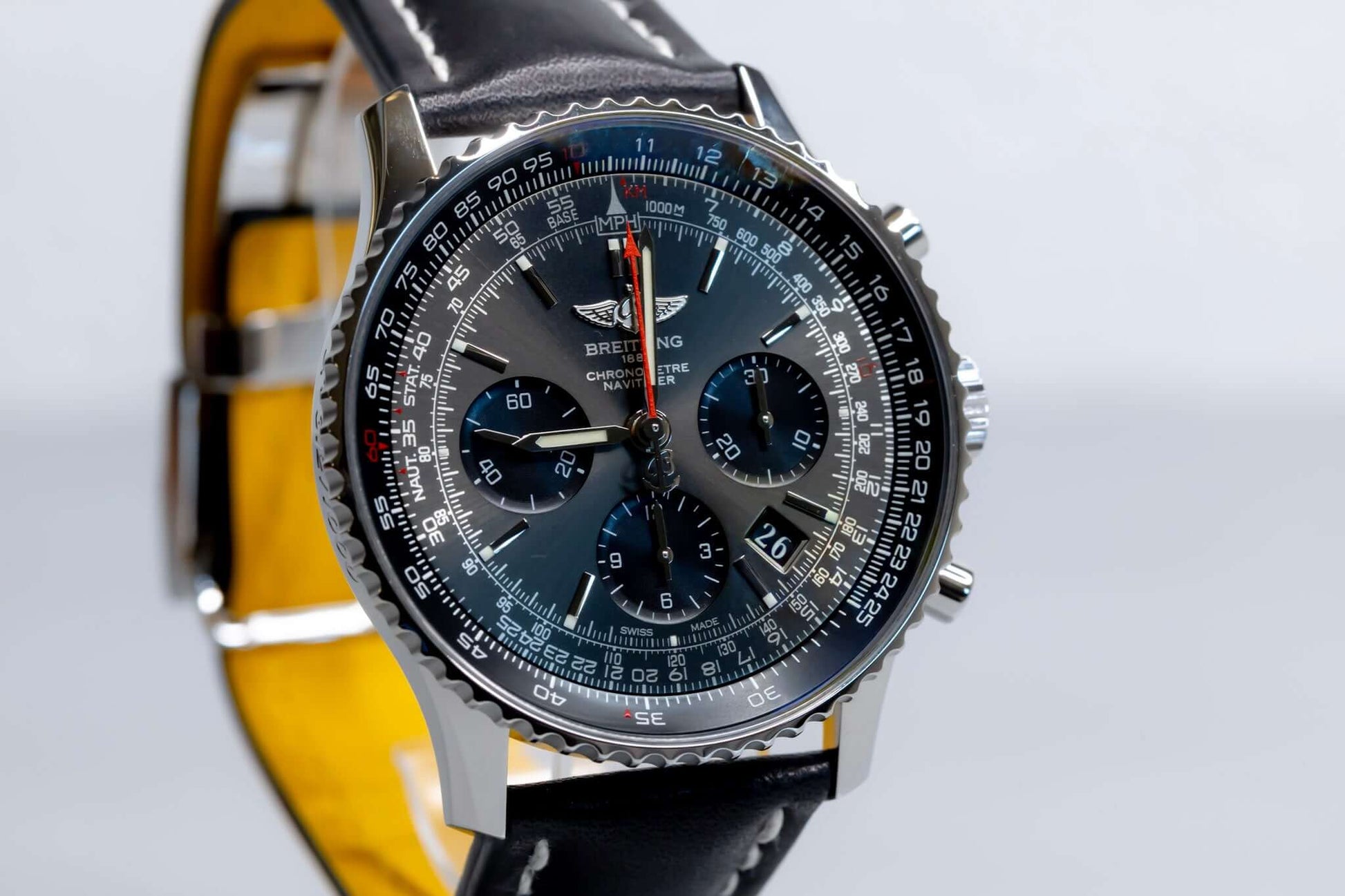 Breitling Navitimer 01 Stratus Gray limited edition with sleek black leather strap and detailed chronograph features.