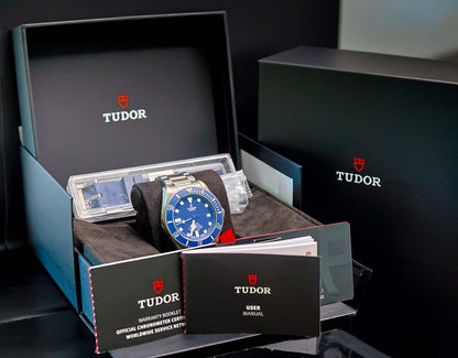 TUDOR Pelagos Titanium Diver watch - 42mm Blue Dial Diver – Full Set displayed in its box with warranty documents and user manual.