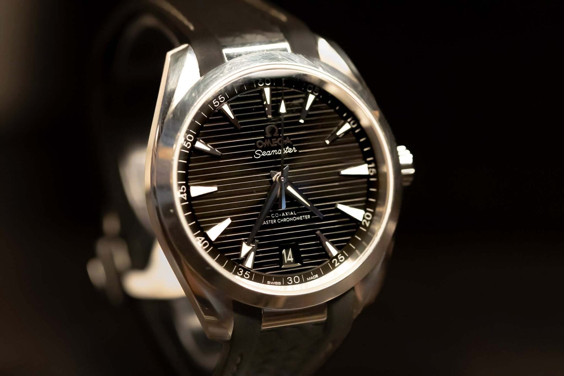 2022 Omega Seamaster Aqua Terra watch featuring a black teak-pattern dial and stainless steel case.