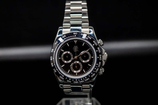 Kingdom 7750 Automatic Chronograph watch in black on black design with stainless steel bracelet.