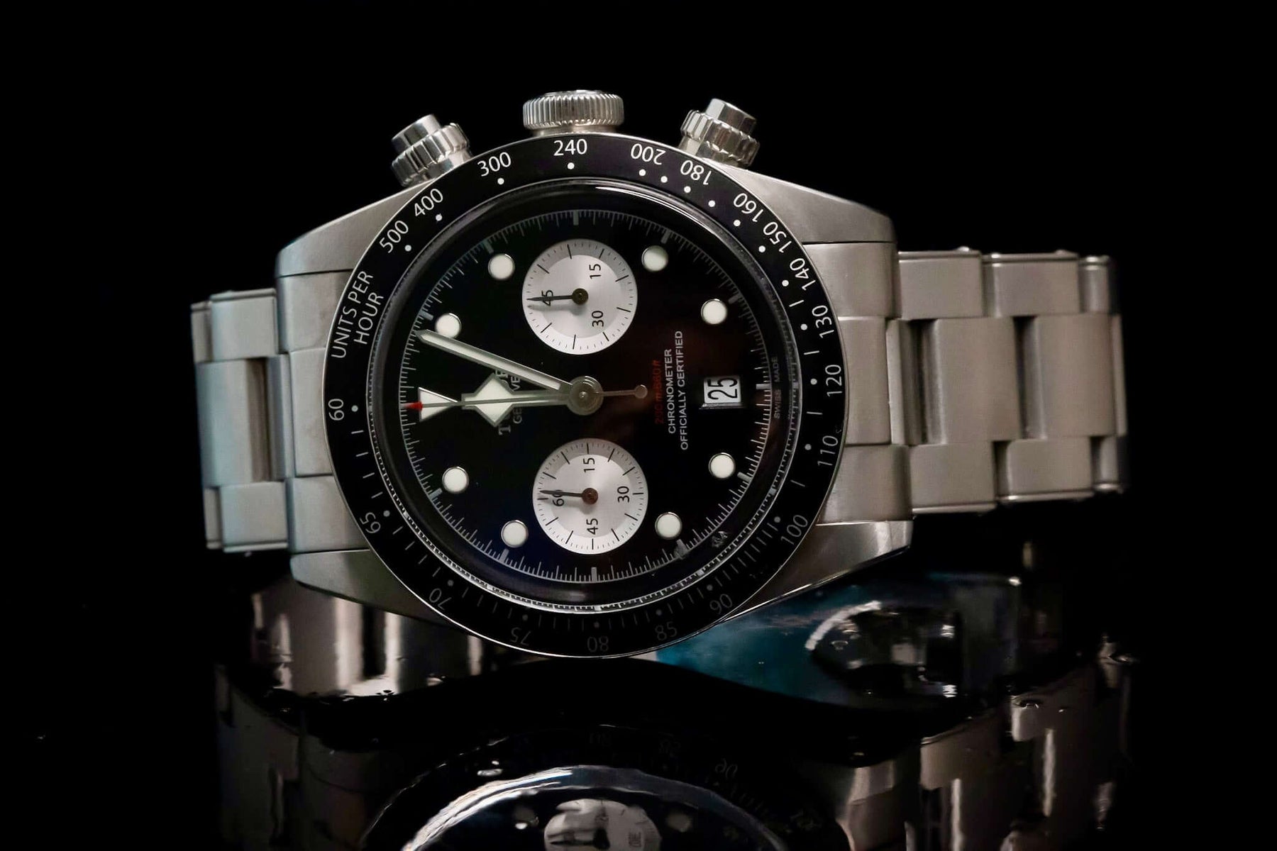 TUDOR Black Bay Chronograph – Reverse Panda Dial – Ref. 79360N – Full Set displayed on a reflective surface.
