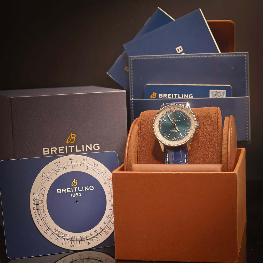 Breitling Navitimer Automatic 41 Blue Dial Ref. A17325211C1P1 – Swiss Luxury Pilot’s Watch in stylish packaging.