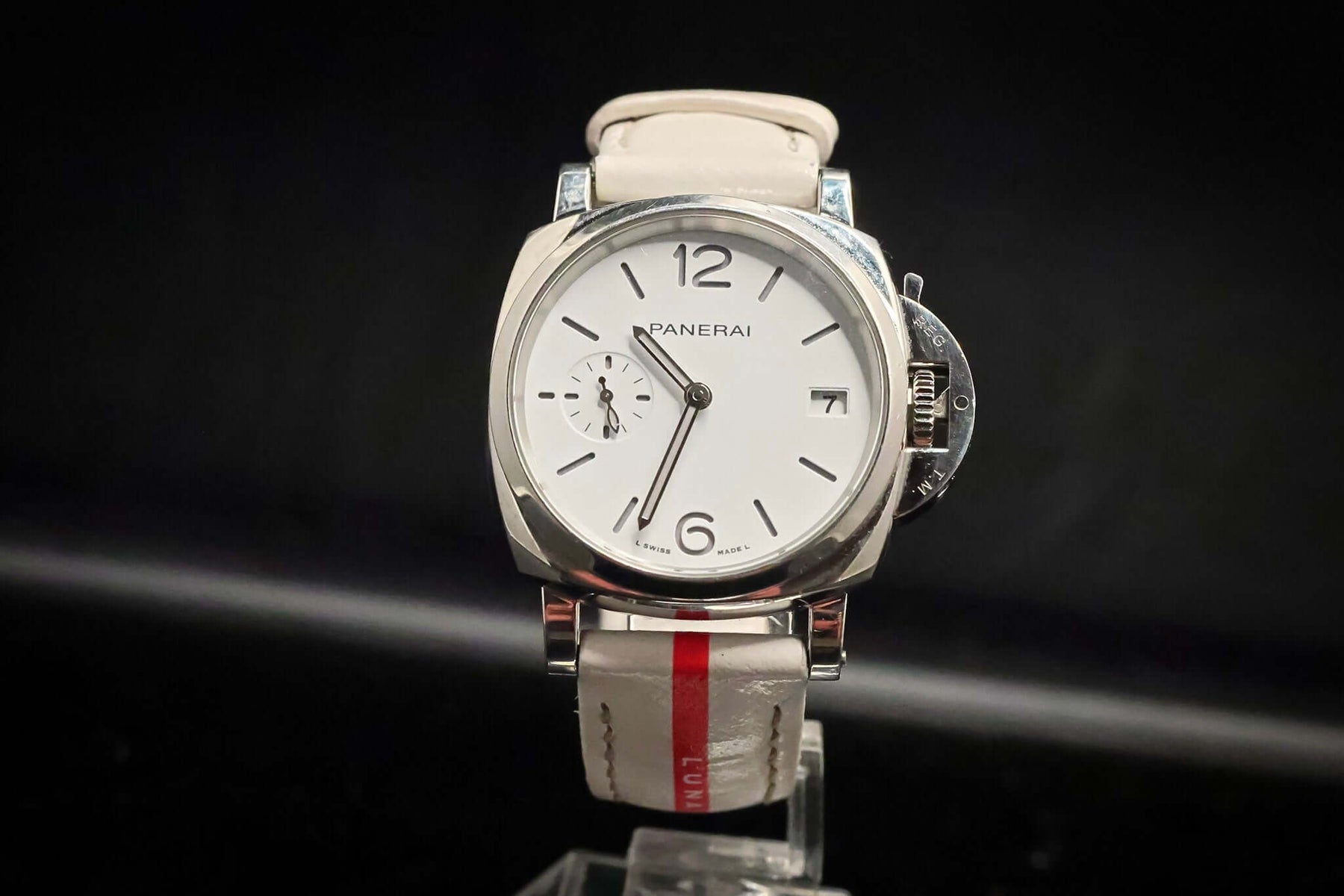 Panerai Luminor Submersible Luna Rossa PAM01306 – 38MM Stainless Steel Men’s Watch – Full Set displayed on a stand.