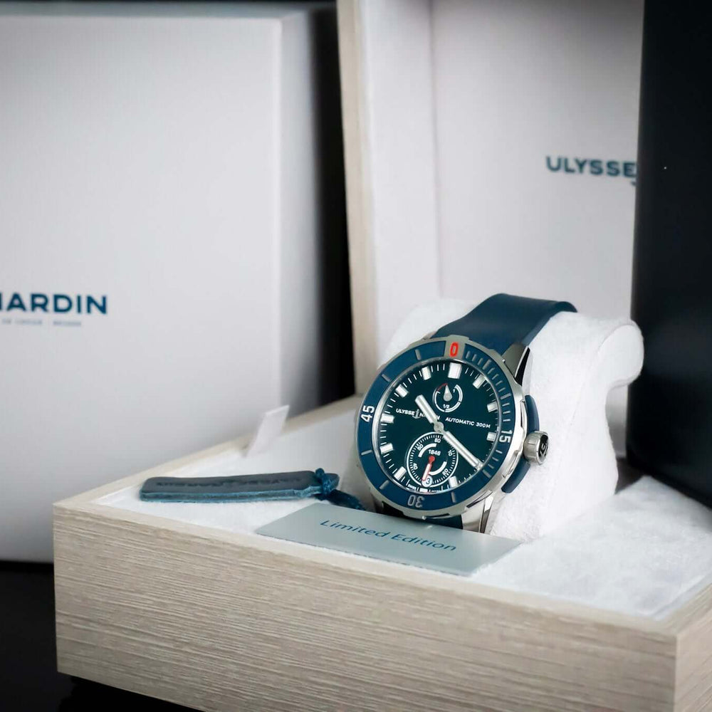 Ulysse Nardin Blue Diver Watch - 1183-170-3/93 displayed in its box with blue dial and strap.