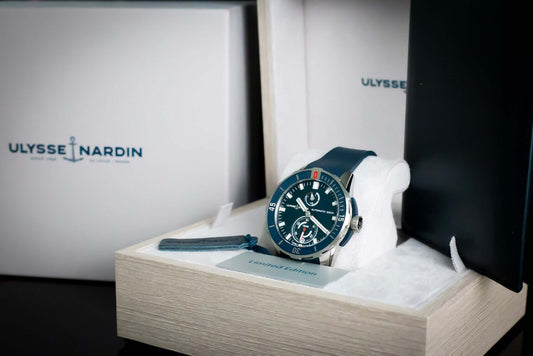 Ulysse Nardin Blue Diver Watch - 1183-170-3/93 displayed in its box with blue dial and strap.