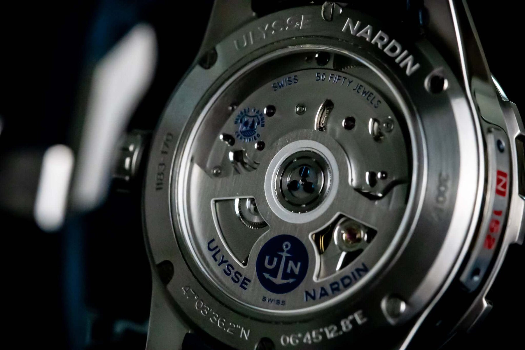 Ulysse Nardin Blue Diver Watch - 1183-170-3/93 detailed view of movement and branding