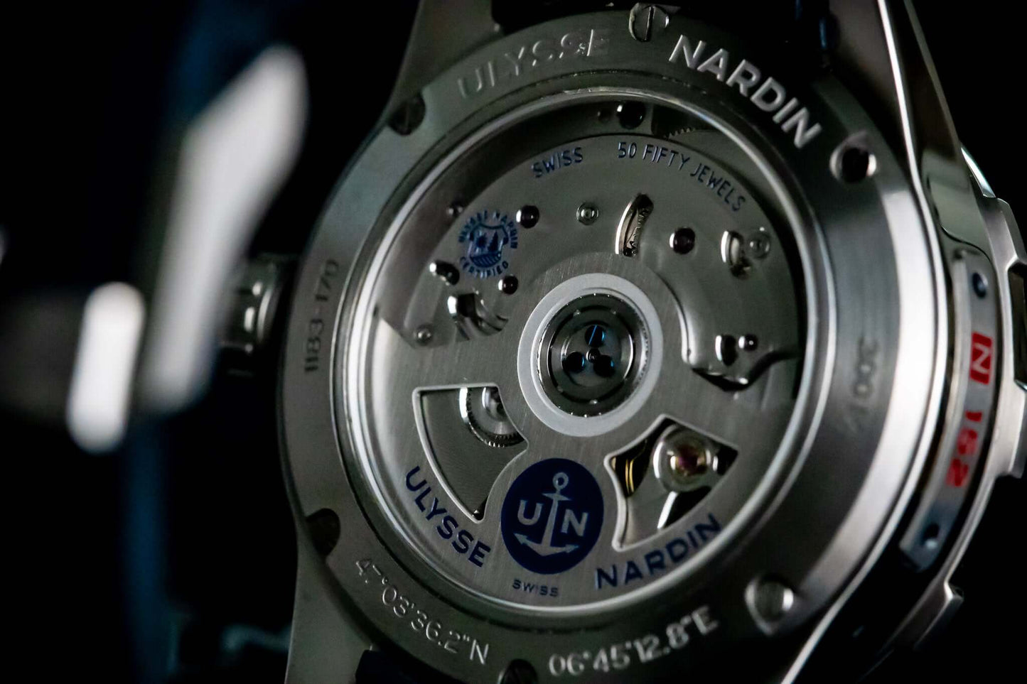Ulysse Nardin Blue Diver Watch - 1183-170-3/93 detailed view of movement and branding