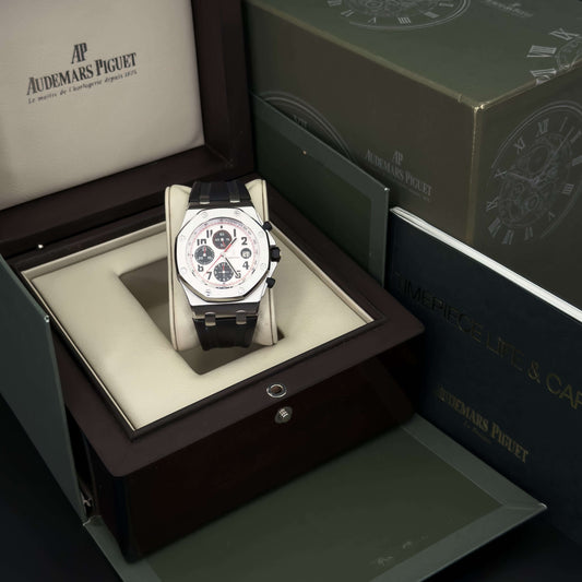Audemars Piguet Royal Oak Offshore men's watch displayed in luxury box with crisp white dial and black strap.