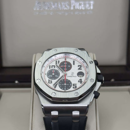 Audemars Piguet Royal Oak Offshore men's watch with white hobnail dial and red chronograph accents in display box.
