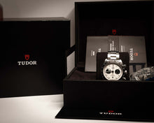 Tudor Black Bay Chronograph Panda presented in elegant packaging with accessories.