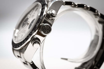 Close-up of the 2023 Tudor Black Bay Chronograph Panda showcasing its stainless steel case and chronograph pushers.