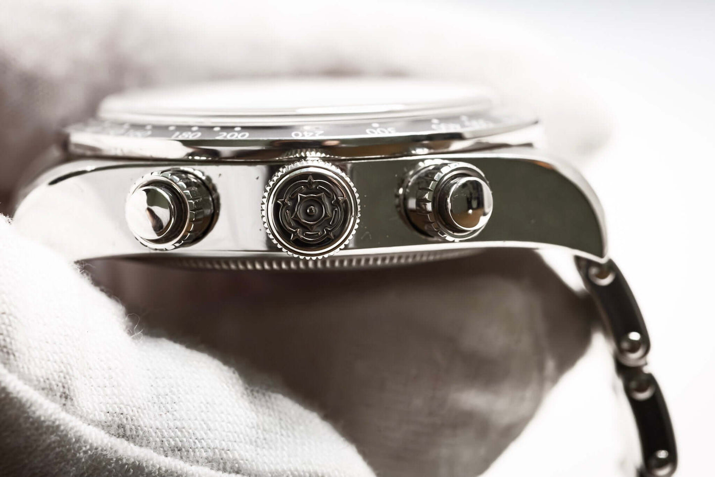 Tudor Black Bay Chronograph Panda close-up showing chronograph pushers and sleek stainless steel case.
