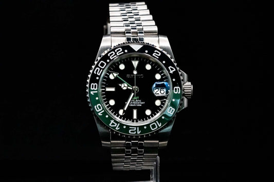 SeikoMod Sprite GMT Explorer front view with green and black bezel