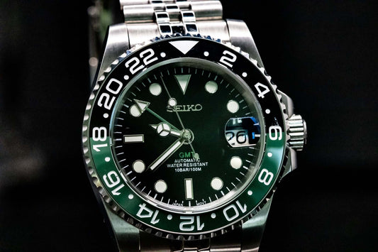 Close-up of SeikoMod Sprite GMT Explorer dial with 24-hour GMT hand and bold markers