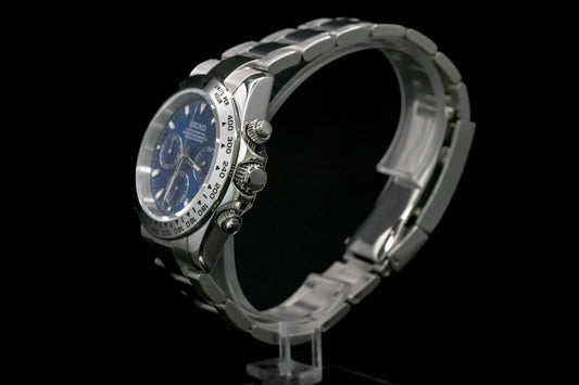 Angled shot of SeikoMod Blue Daytona showing tachymeter bezel and stainless steel case