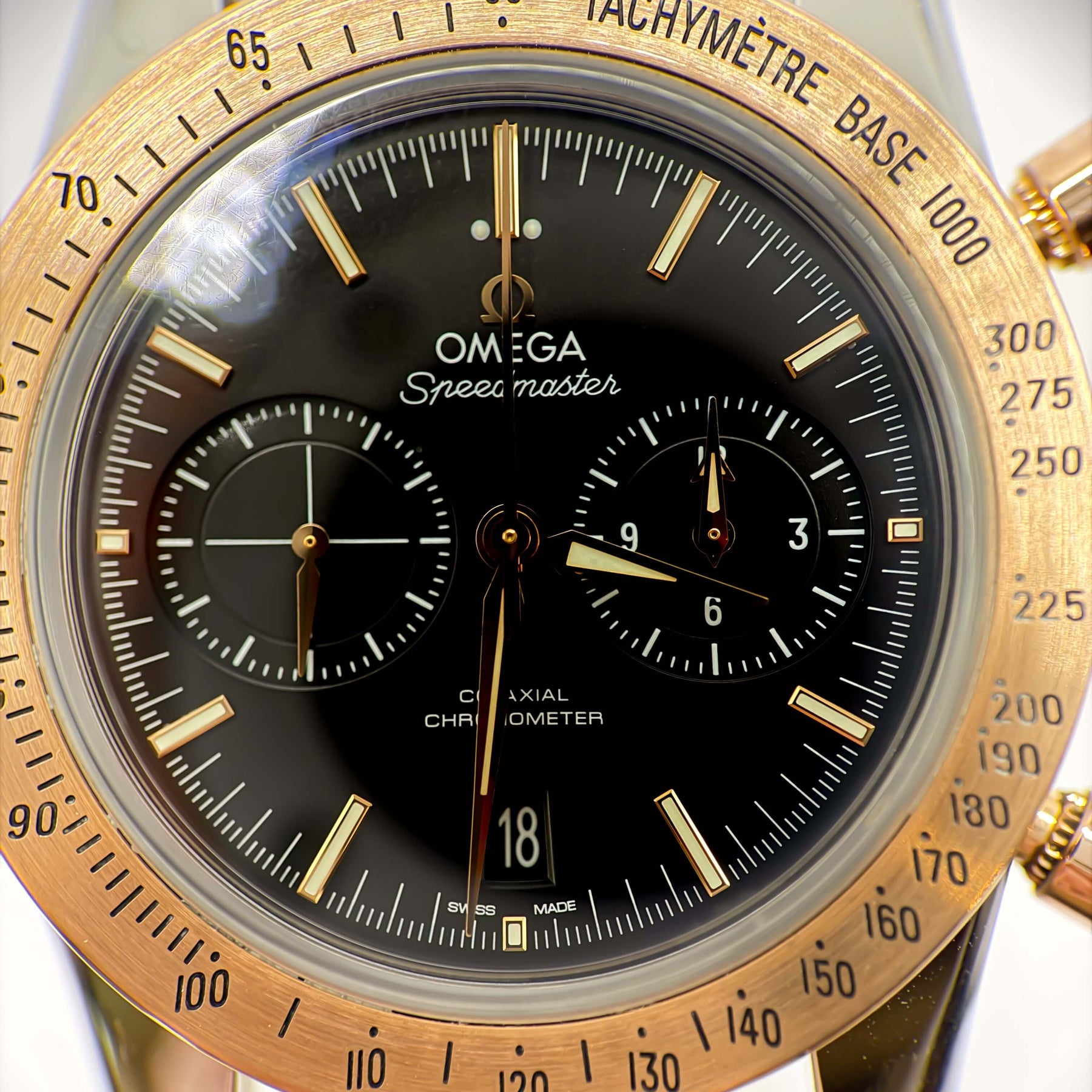 Omega Speedmaster '57 41.5mm Gold and Steel Omega 331.22.42.51.01.001 black dial chronograph close-up