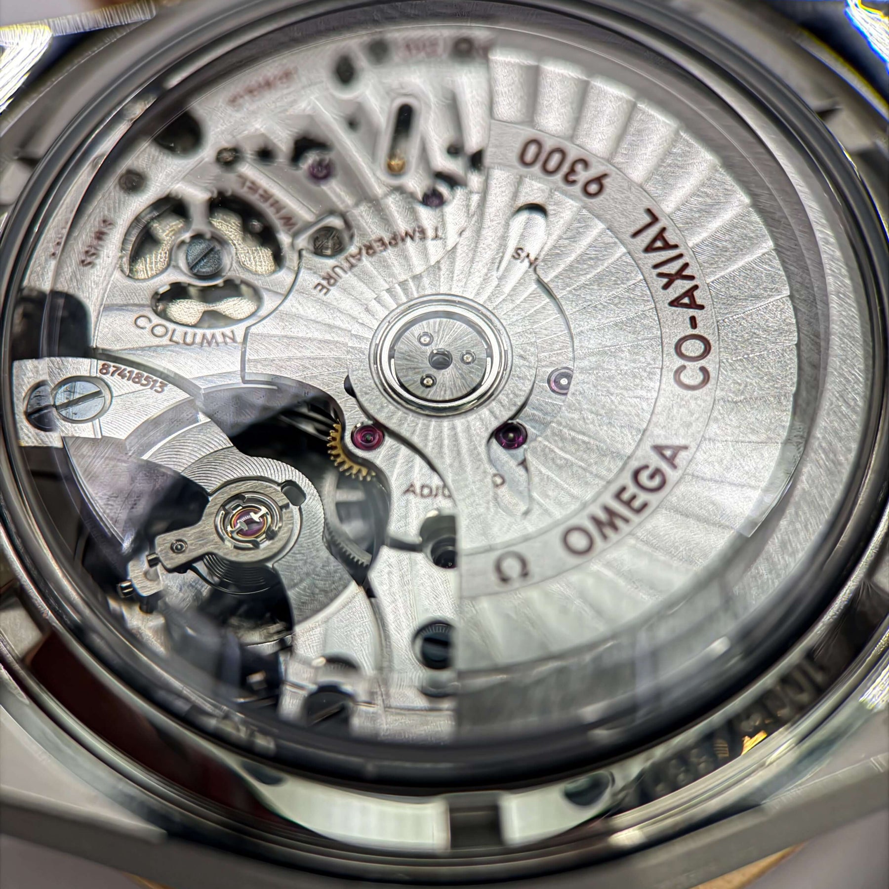 Omega Speedmaster '57 41.5mm Gold and Steel Omega 331.22.42.51.01.001 movement detail with intricate mechanics.