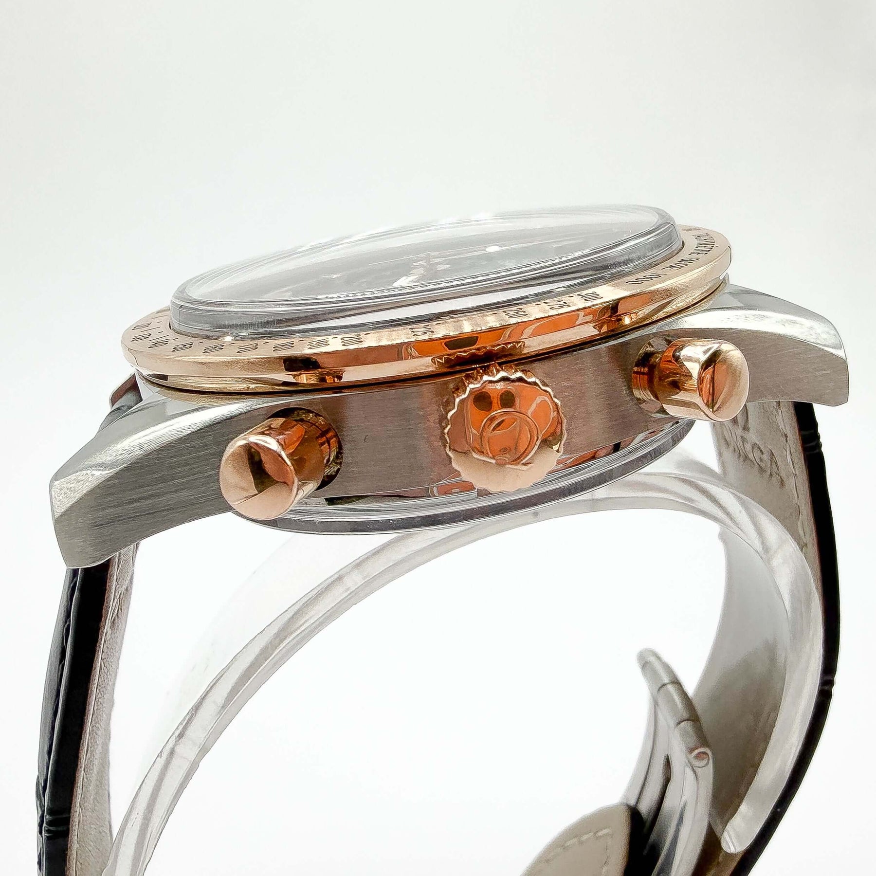 Omega Speedmaster '57 41.5mm Gold and Steel Omega 331.22.42.51.01.001 showing side view with chronograph buttons.
