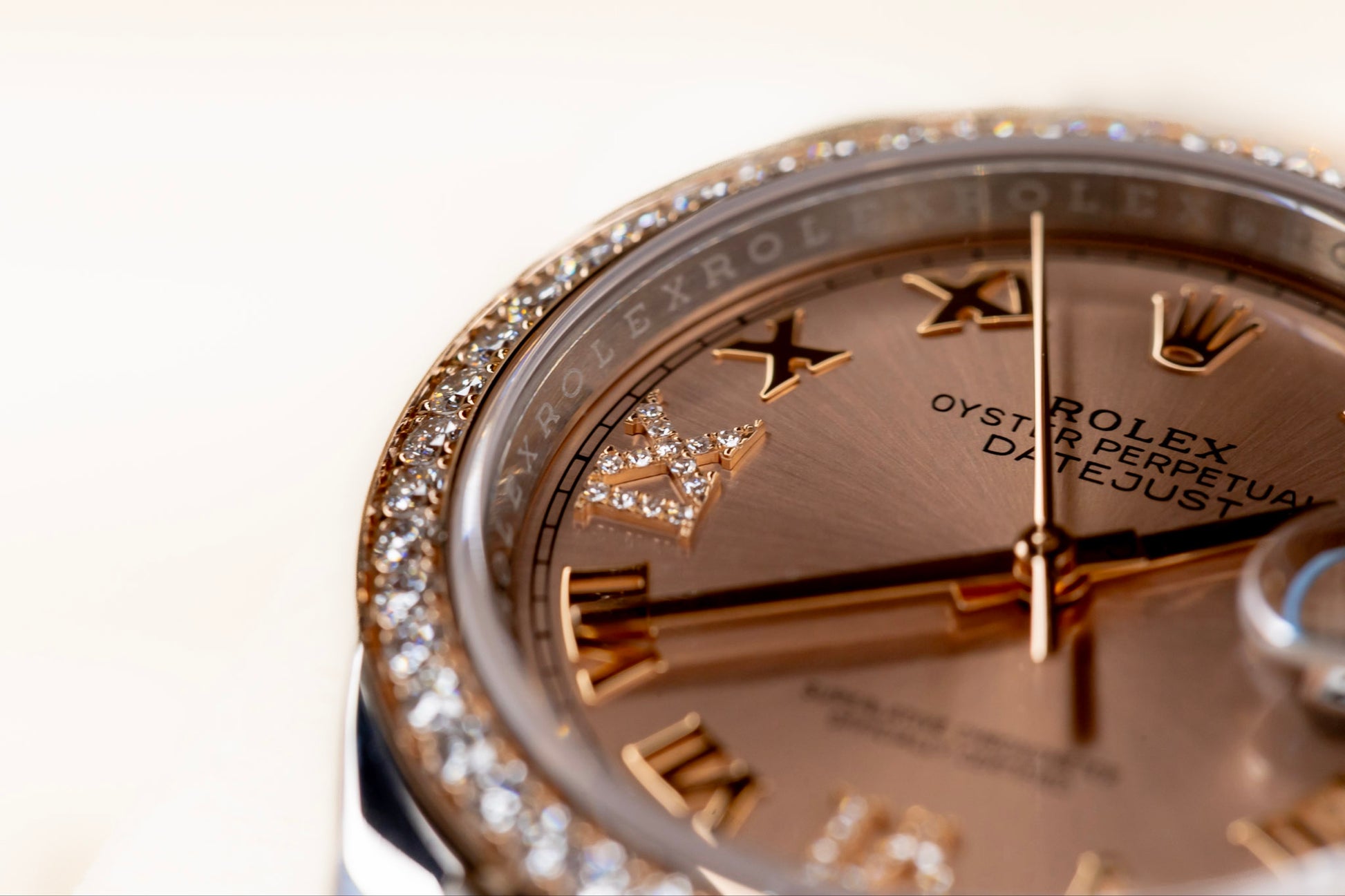 Rolex Datejust 36 watch with Everose gold and diamond bezel, showcasing timeless elegance and craftsmanship.