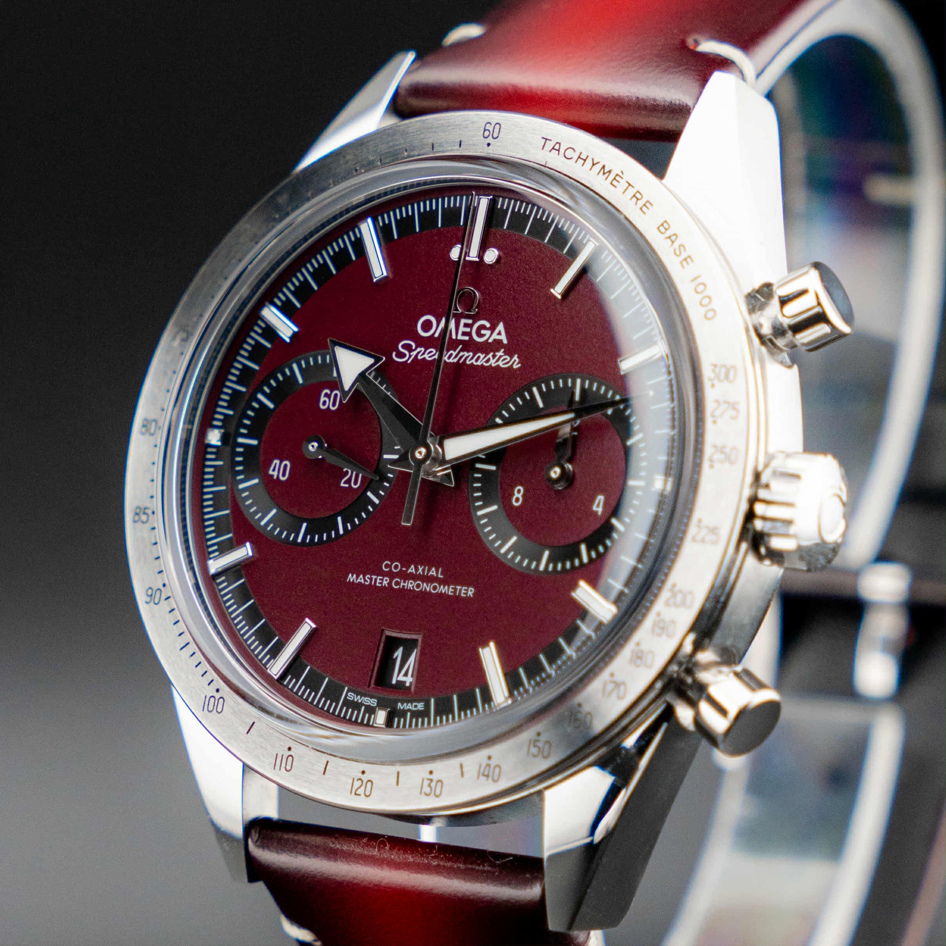 Omega Speedmaster '57 Burgundy full set with a deep burgundy dial and vintage-inspired hands.
