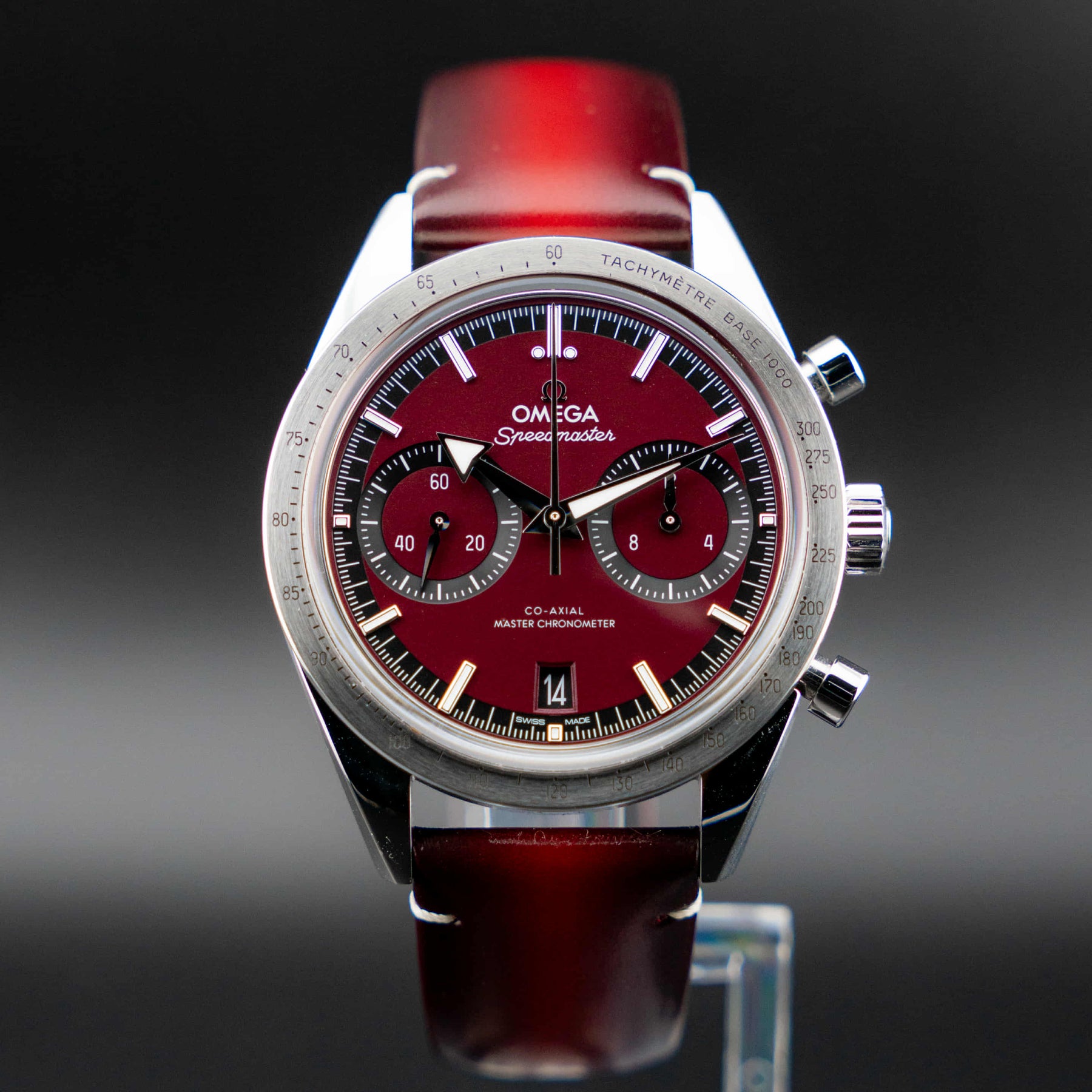 Omega Speedmaster '57 Burgundy full set with a deep burgundy dial and vintage broad arrow hands.