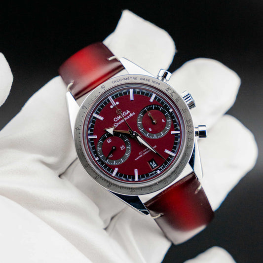 Omega Speedmaster '57 Burgundy full set close-up with burgundy dial and chronograph features