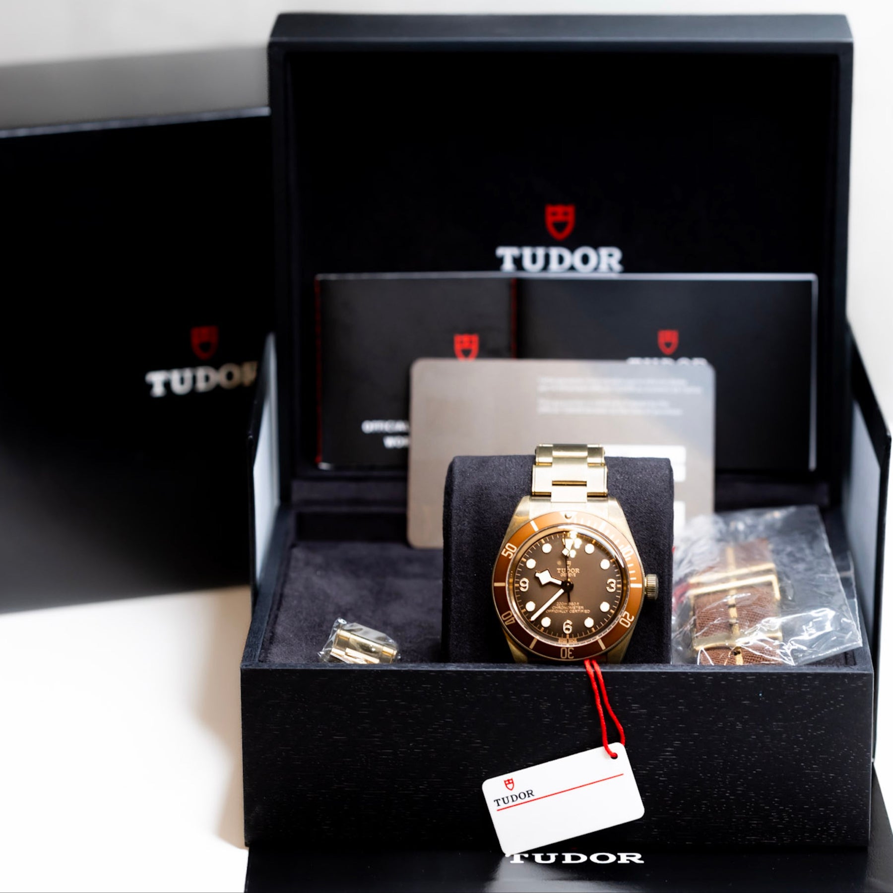 2022 Tudor Black Bay Fifty-Eight bronze watch with original box and papers displayed.