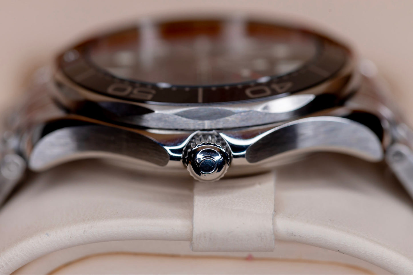 Omega Seamaster Diver original box papers close-up of watch case and crown detail