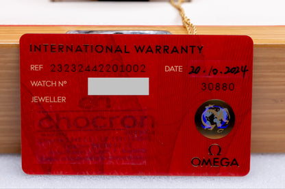 2024 Omega Seamaster Planet Ocean GMT watch international warranty card with details and Omega logo.