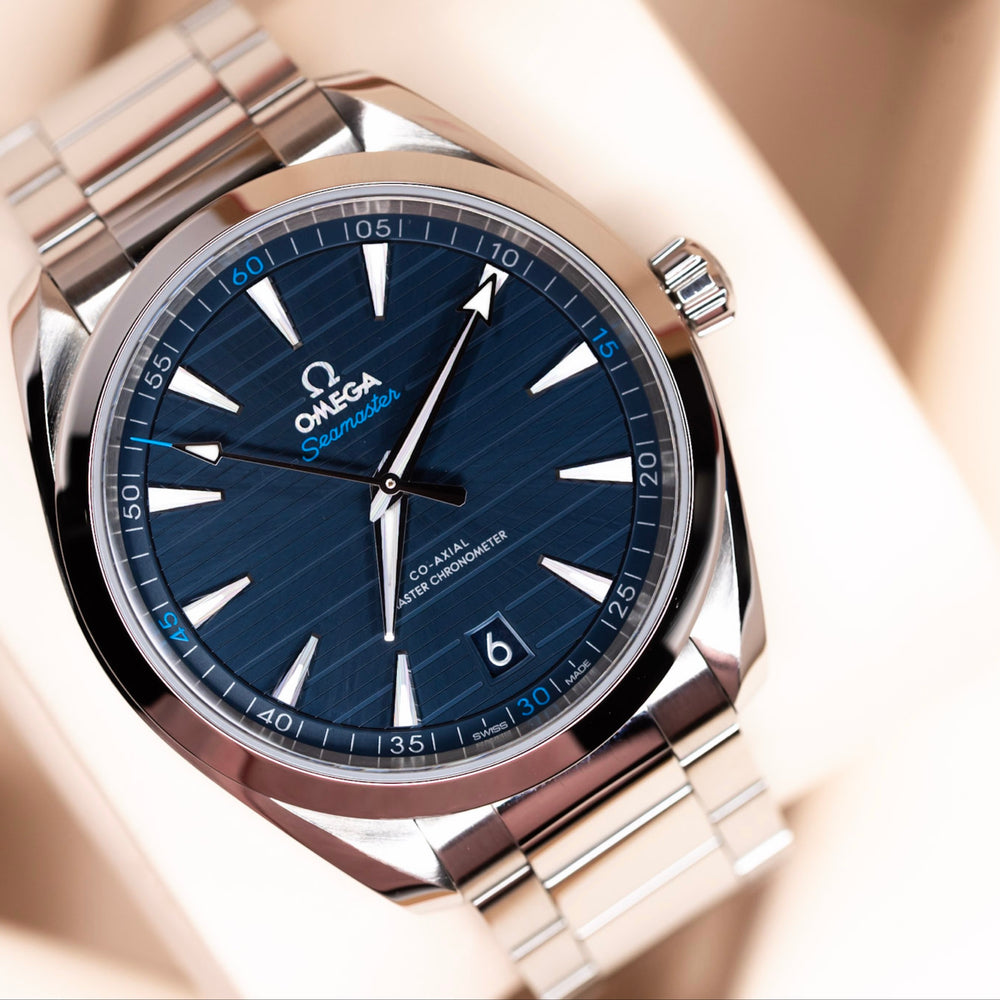 Omega Seamaster Aqua Terra 220.10.41.21.03.001 blue dial watch on display