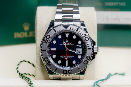2024 Rolex Yachtmaster Superman on display with a platinum bezel and stainless steel bracelet.