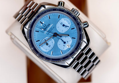 Omega Speedmaster Chronograph 38 review featuring a blue dial and stainless steel case and bracelet.