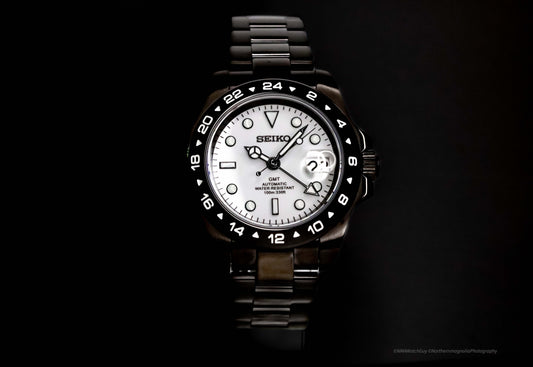 Black SeikoMod Explorer II GMT front view with black dial and 24-hour bezel