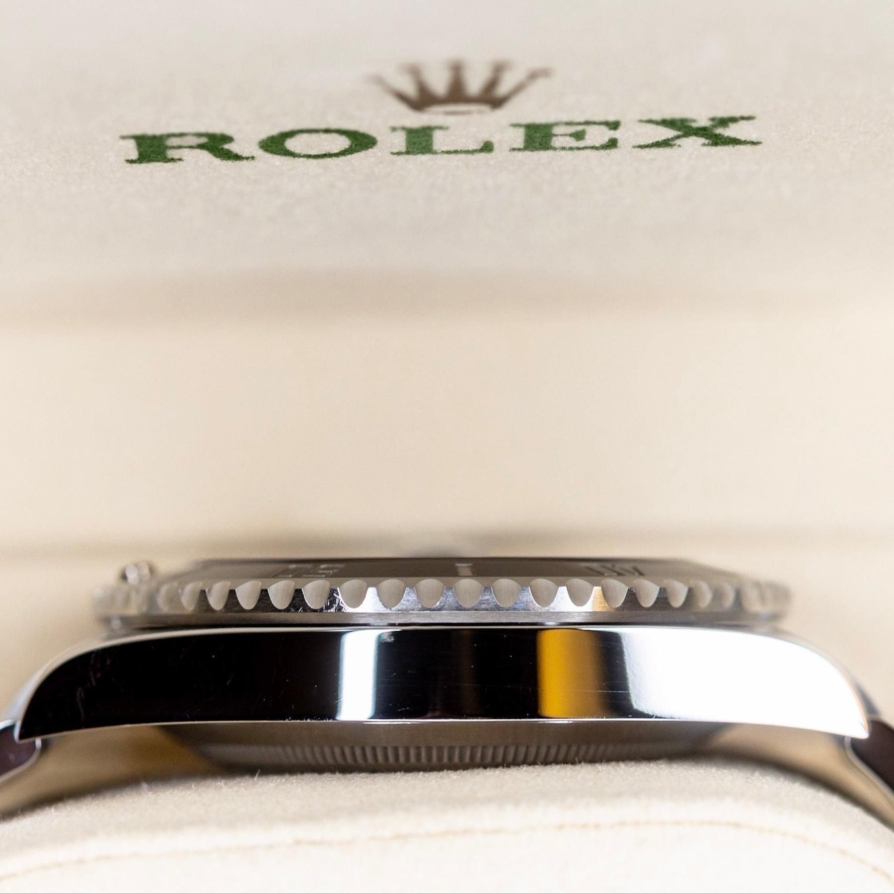 2025 Rolex Submariner Date black watch displayed in a Rolex box highlighting its elegant design.