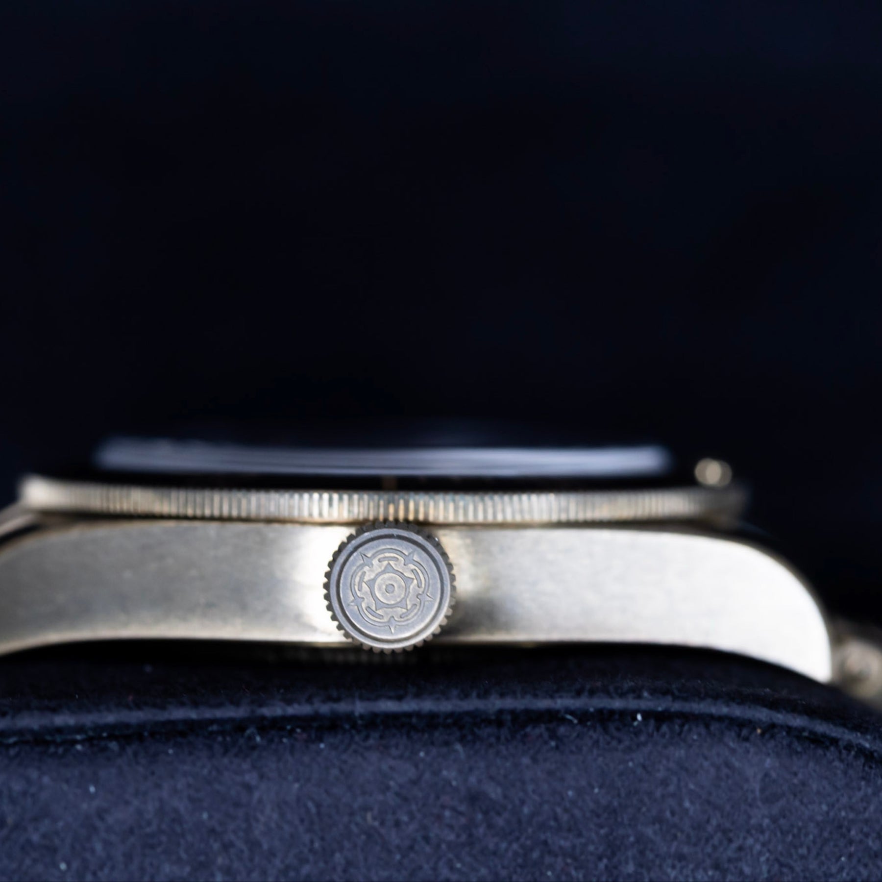 2022 Tudor Black Bay Fifty-Eight bronze watch side view showcasing the crown and satin-brushed bronze finish.