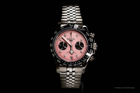SeikoMod Pink BB Chrono watch featuring a pink dial, stainless steel oyster bracelet, and Daytona-inspired design.