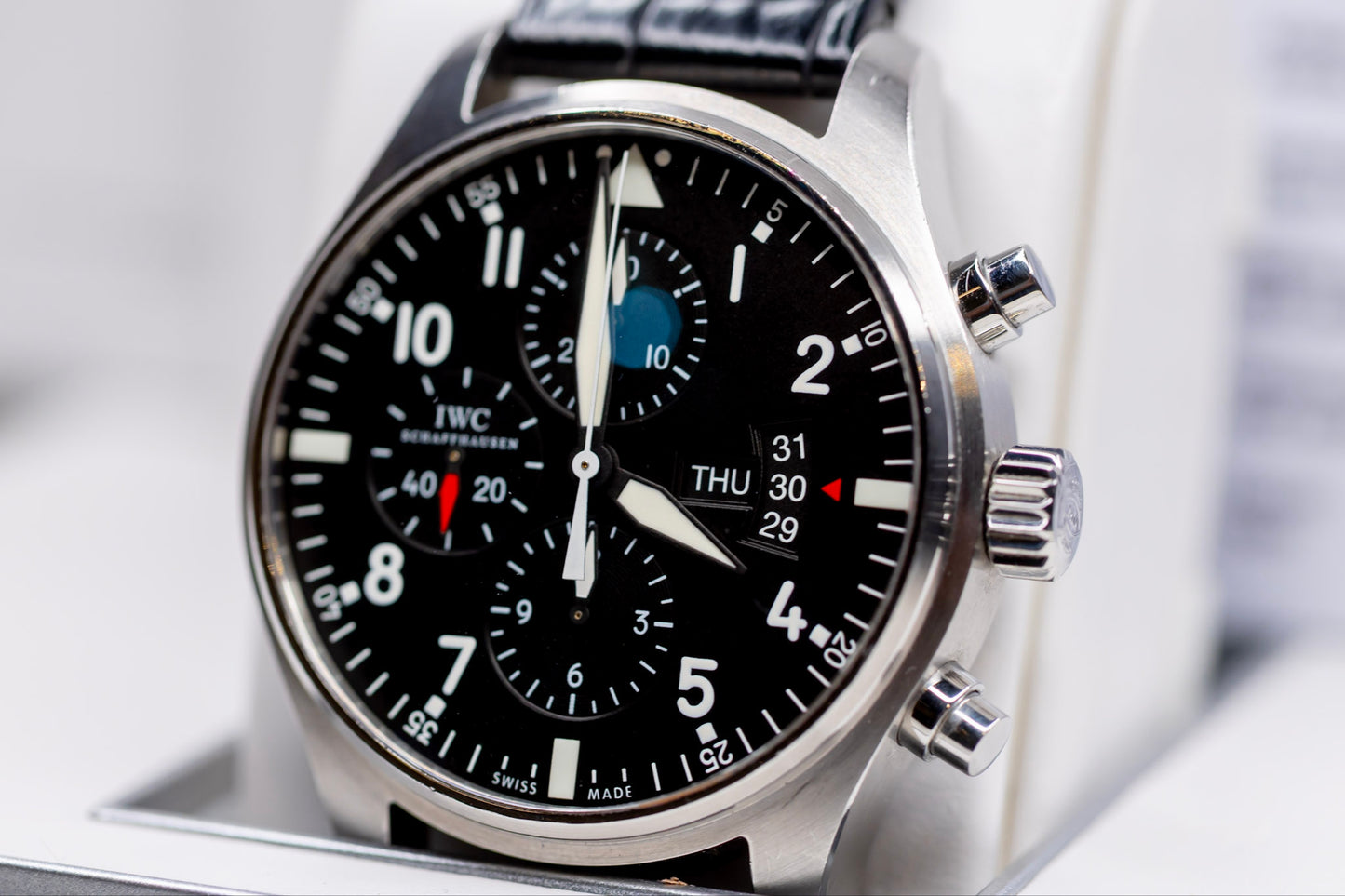 IWC Pilots Watch Chronograph showcasing black dial and automatic chronograph features.