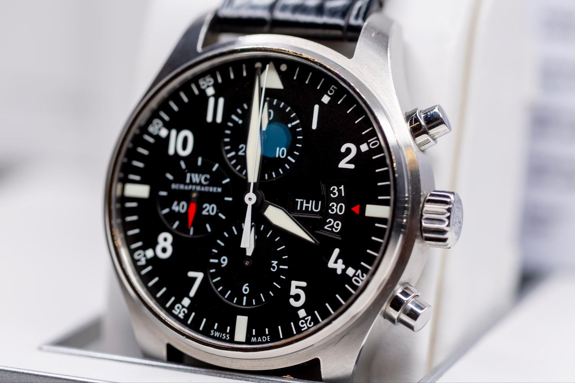 IWC Pilots Watch Chronograph showcasing black dial and automatic chronograph features.